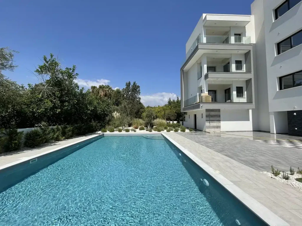 Apartments in a residential complex with a swimming pool near the sea
